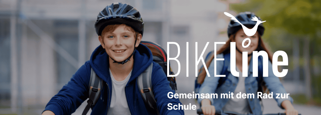 Eine Schülerin und ein Schüler fahren mit dem Rad bei der BIKEline mit.